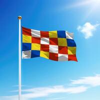 Waving flag of Antwerp is a province of Belgium on flagpole photo