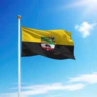 Waving flag of Saxony-Anhalt is a state of Germany on flagpole photo