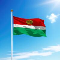 Waving flag of Kaluga is a region of Russia on flagpole photo