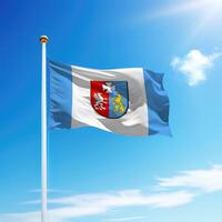 Waving flag of Subcarpathia is a region of Poland on flagpole photo