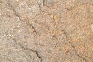 Abstract natural rock stone granite grunge rusty metal texture design background natural color stone material granite design wallpaper. Close-up detail of natural stone photo