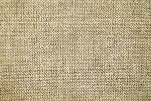 Natural linen material textile canvas Fabric texture background Close-up detail of fabric natural color Hemp material pattern design wallpaper. can be used as background or for graphic design photo