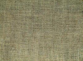 Natural linen material textile canvas Fabric texture background Close-up detail of fabric natural color Hemp material pattern design wallpaper. can be used as background or for graphic design photo