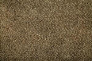 Natural linen material textile canvas Fabric texture background Close-up detail of fabric natural color Hemp material pattern design wallpaper. can be used as background or for graphic design photo