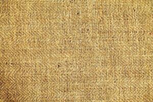 Natural linen material textile canvas Fabric texture background Close-up detail of fabric natural color Hemp material pattern design wallpaper. can be used as background or for graphic design photo