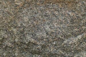 Abstract natural rock stone granite grunge rusty metal texture design background natural color stone material granite design wallpaper. Close-up detail of natural stone photo