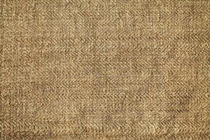 Natural linen material textile canvas Fabric texture background Close-up detail of fabric natural color Hemp material pattern design wallpaper. can be used as background or for graphic design photo
