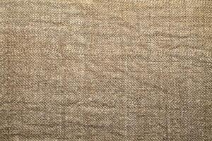 Natural linen material textile canvas Fabric texture background Close-up detail of fabric natural color Hemp material pattern design wallpaper. can be used as background or for graphic design photo