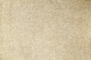 Natural linen material textile canvas Fabric texture background Close-up detail of fabric natural color Hemp material pattern design wallpaper. can be used as background or for graphic design photo