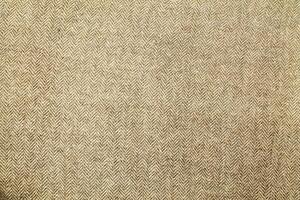 Natural linen material textile canvas Fabric texture background Close-up detail of fabric natural color Hemp material pattern design wallpaper. can be used as background or for graphic design photo