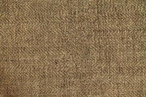 Natural linen material textile canvas Fabric texture background Close-up detail of fabric natural color Hemp material pattern design wallpaper. can be used as background or for graphic design photo