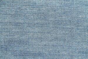 Natural linen material textile canvas Fabric texture background Close-up detail of fabric natural color Hemp material pattern design wallpaper. can be used as background or for graphic design photo