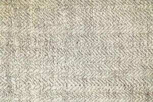 Natural linen material textile canvas Fabric texture background Close-up detail of fabric natural color Hemp material pattern design wallpaper. can be used as background or for graphic design photo