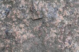 Abstract natural rock stone granite grunge rusty metal texture design background natural color stone material granite design wallpaper. Close-up detail of natural stone photo