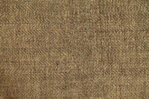 Natural linen material textile canvas Fabric texture background Close-up detail of fabric natural color Hemp material pattern design wallpaper. can be used as background or for graphic design photo
