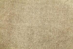 Natural linen material textile canvas Fabric texture background Close-up detail of fabric natural color Hemp material pattern design wallpaper. can be used as background or for graphic design photo