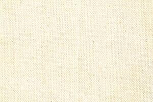Natural linen material textile canvas Fabric texture background Close-up detail of fabric natural color Hemp material pattern design wallpaper. can be used as background or for graphic design photo