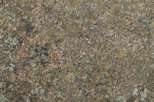 Abstract natural rock stone granite grunge rusty metal texture design background natural color stone material granite design wallpaper. Close-up detail of natural stone photo