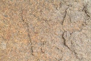 Abstract natural rock stone granite grunge rusty metal texture design background natural color stone material granite design wallpaper. Close-up detail of natural stone photo