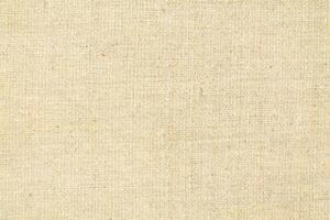 Natural linen material textile canvas Fabric texture background Close-up detail of fabric natural color Hemp material pattern design wallpaper. can be used as background or for graphic design photo