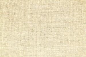 Natural linen material textile canvas Fabric texture background Close-up detail of fabric natural color Hemp material pattern design wallpaper. can be used as background or for graphic design photo