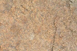 Abstract natural rock stone granite grunge rusty metal texture design background natural color stone material granite design wallpaper. Close-up detail of natural stone photo