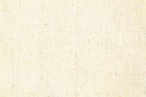 Natural linen material textile canvas Fabric texture background Close-up detail of fabric natural color Hemp material pattern design wallpaper. can be used as background or for graphic design photo