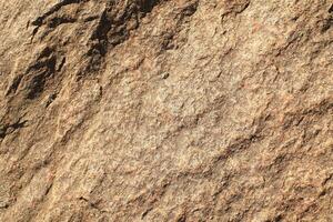 Abstract natural rock stone granite grunge rusty metal texture design background natural color stone material granite design wallpaper. Close-up detail of natural stone photo