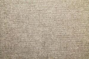 Natural linen material textile canvas Fabric texture background Close-up detail of fabric natural color Hemp material pattern design wallpaper. can be used as background or for graphic design photo