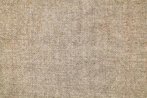 Natural linen material textile canvas Fabric texture background Close-up detail of fabric natural color Hemp material pattern design wallpaper. can be used as background or for graphic design photo