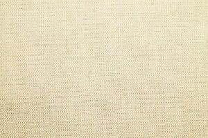 Natural linen material textile canvas Fabric texture background Close-up detail of fabric natural color Hemp material pattern design wallpaper. can be used as background or for graphic design photo