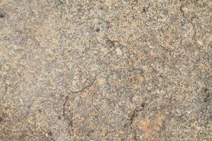Abstract natural rock stone granite grunge rusty metal texture design background natural color stone material granite design wallpaper. Close-up detail of natural stone photo