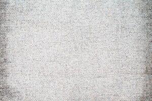 Natural linen material textile canvas Fabric texture background Close-up detail of fabric natural color Hemp material pattern design wallpaper. can be used as background or for graphic design photo