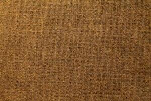 Natural linen material textile canvas Fabric texture background Close-up detail of fabric natural color Hemp material pattern design wallpaper. can be used as background or for graphic design photo