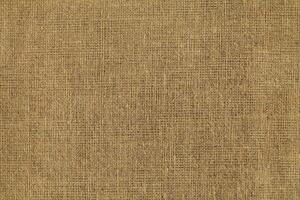 Natural linen material textile canvas Fabric texture background Close-up detail of fabric natural color Hemp material pattern design wallpaper. can be used as background or for graphic design photo