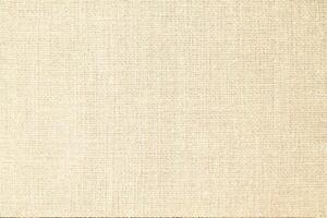 Natural linen material textile canvas Fabric texture background Close-up detail of fabric natural color Hemp material pattern design wallpaper. can be used as background or for graphic design photo