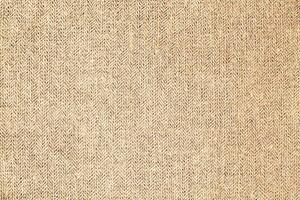 Natural linen material textile canvas Fabric texture background Close-up detail of fabric natural color Hemp material pattern design wallpaper. can be used as background or for graphic design photo