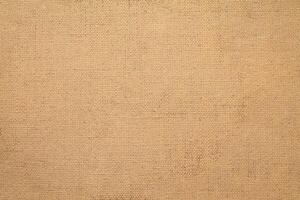 Natural linen material textile canvas Fabric texture background Close-up detail of fabric natural color Hemp material pattern design wallpaper. can be used as background or for graphic design photo