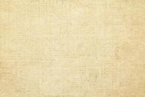 Natural linen material textile canvas Fabric texture background Close-up detail of fabric natural color Hemp material pattern design wallpaper. can be used as background or for graphic design photo