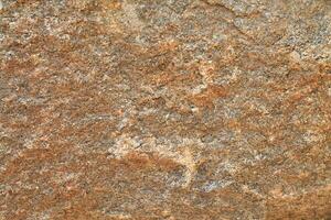 Abstract natural rock stone granite grunge rusty metal texture design background natural color stone material granite design wallpaper. Close-up detail of natural stone photo