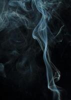 Abstract white smoke texture moves on black background Plume of smoke wave design wallpaper. Design element. Abstract texture photo