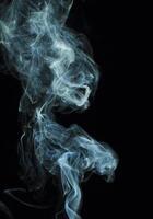 Abstract white smoke texture moves on black background Plume of smoke wave design wallpaper. Design element. Abstract texture photo