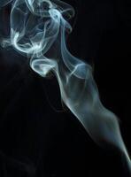 Abstract white smoke texture moves on black background Plume of smoke wave design wallpaper. Design element. Abstract texture photo