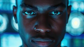 A close-up portrait of a young African male software developer photo