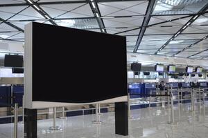 Hong Kong international airport terminal departure counter with information display photo