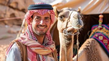 Smiling bedouin tour guide poses with camel in desert setting photo
