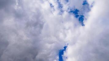 View from top to bottom showing the sky, forest and depth of the lake video