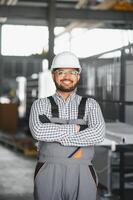 PVC industry worker or operator making frames for windows and doors photo