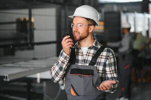 portrait of a confident worker in a factory photo
