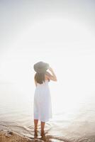 beautiful woman on vacation in a luxury hotel photo